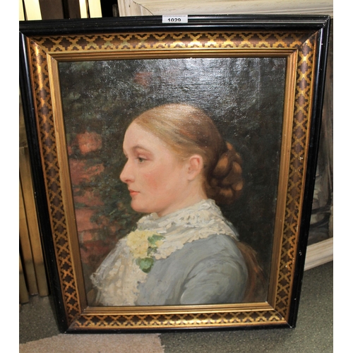 1029 - 19th Century oil on canvas, profile portrait of a lady, 46cms x 36cms, housed in a gilded and ebonis... 