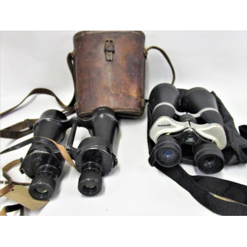 119 - Pair of World War II binoculars by Ross of London, together with a cased pair of modern binoculars