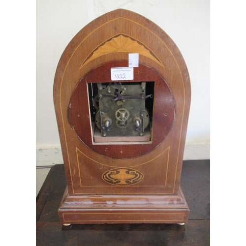 1222 - Arts & Crafts oak cased bracket clock, the silvered dial with Roman numerals and three train movemen... 