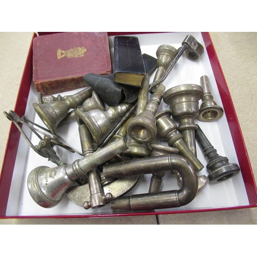 123 - Quantity of brass musical instrument mouthpieces, together with a Finger Book of Common Prayer and a... 