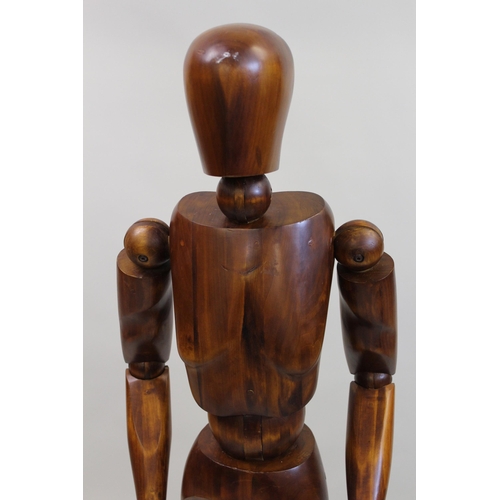 1252 - Artist's modern carved hardwood ley figure by Halfpenny Mannequins, mounted on a black painted metal... 