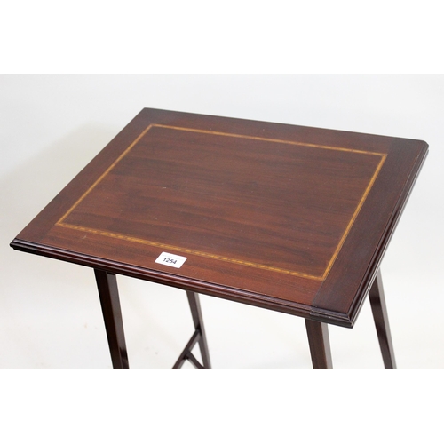 1254 - Edwardian mahogany crossbanded and inlaid fold-over card table, with baize lined interior, raised on... 