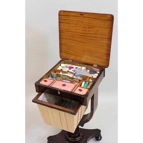 1255 - 19th Century rosewood work table with hinged cover, fitted interior and silkwork wool basket, on a f... 