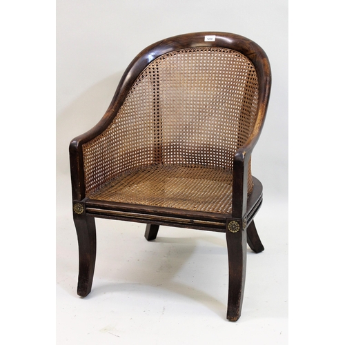 1258 - 19th Century beechwood tub-shaped bergere armchair on sabre front supports, 79cms high x 54cms wide