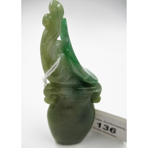 136 - Small 20th Century two colour green jade carving in the form of a two handled vase, 9cm high overall