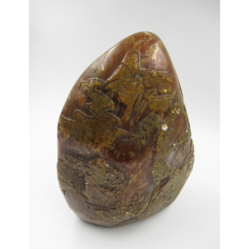 153 - 20th Century carved amber soapstone seal, decorated in shallow relief with figures in a landscape, 1... 