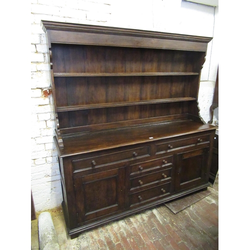 1544 - Good quality reproduction oak dresser, the boarded shelf back above five drawers and two cupboard do... 