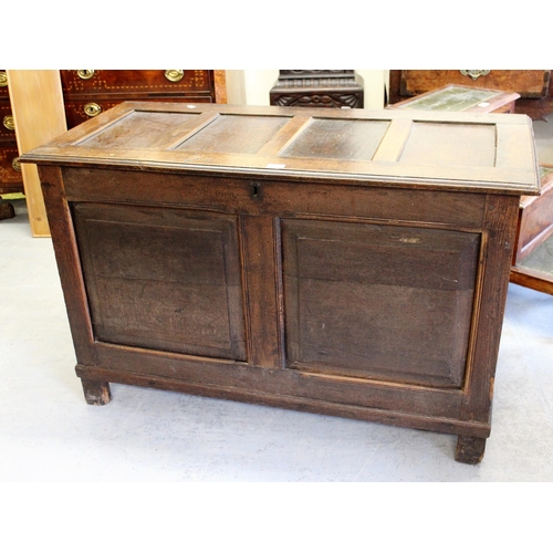 1545 - Large 19th Century oak coffer, the four panel hinged top above a two panel front on stile supports, ... 