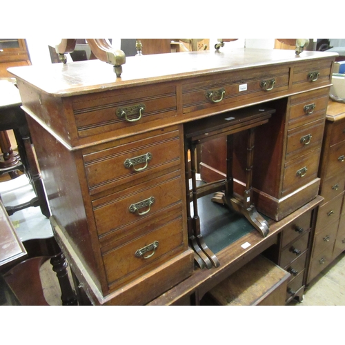 1545A - Edwardian mahogany twin pedestal desk, the brown leather inset top above nine drawers on square tape... 