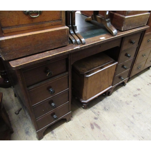 1548 - Mahogany twin pedestal desk, the green rexine inset top above eight drawers with knob handles on sha... 