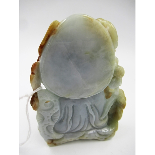 155 - 20th Century carved two colour celadon / rust jade figure of a seated immortal, 10cm high overall