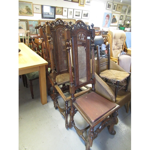 1555 - Pair of Carolean (late 17th Century) walnut side chairs, the high cane inset backs with pierced and ... 