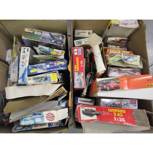 173 - Two boxes containing a large collection of various model aircraft kits including Airfix, Revel etc