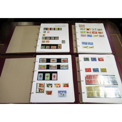 202 - Four albums of stamps, Commonwealth countries