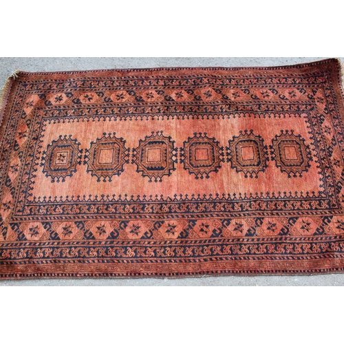22 - Afghan rug with a single row of six gols, 190cms x 115cms, together with a Pakistan rug of Turkoman ... 