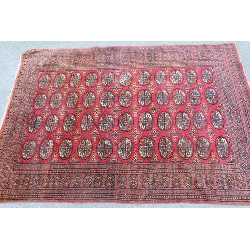 22 - Afghan rug with a single row of six gols, 190cms x 115cms, together with a Pakistan rug of Turkoman ... 