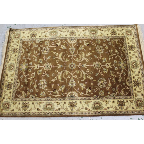 26 - Small Indo Persian rug with an all-over stylised floral design in shades of beige and cream, 181cms ... 