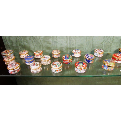 323 - Collection of Halcyon Days enamel trinket boxes, comprising:  seventeen egg shaped and approximately... 