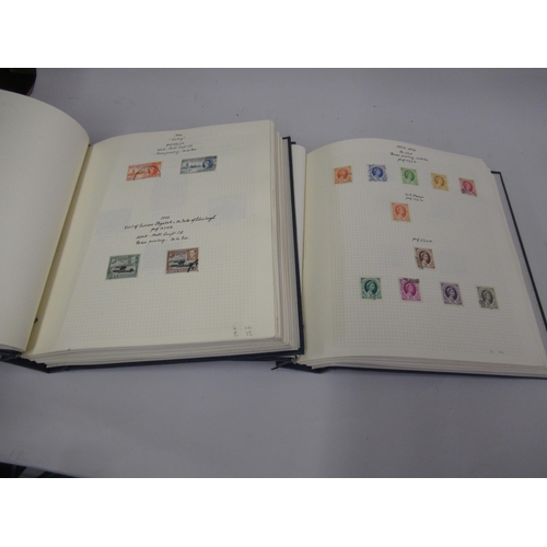 352 - Two Stanley Gibbons Devon albums containing a collection of well written up Commonwealth used stamps... 