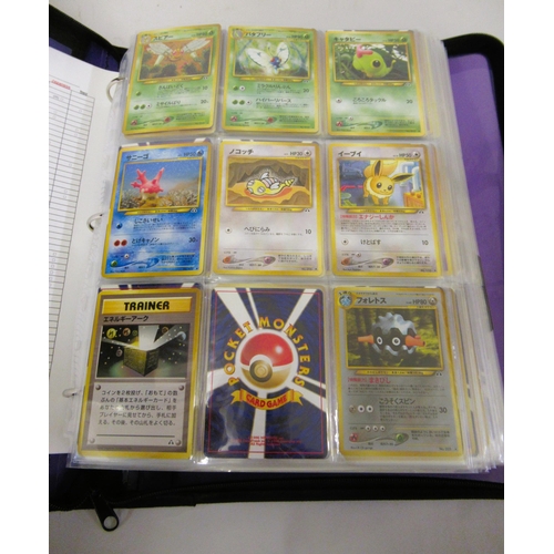 355 - Folder containing a large quantity of Japanese and American Pokemon cards including Base, Jungle, Fo... 