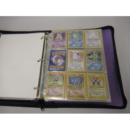 355 - Folder containing a large quantity of Japanese and American Pokemon cards including Base, Jungle, Fo... 