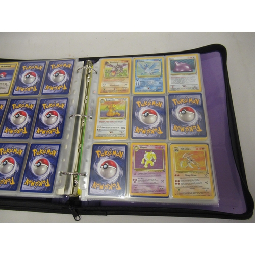 355 - Folder containing a large quantity of Japanese and American Pokemon cards including Base, Jungle, Fo... 