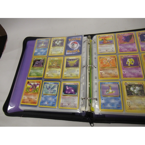 355 - Folder containing a large quantity of Japanese and American Pokemon cards including Base, Jungle, Fo... 