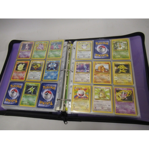 355 - Folder containing a large quantity of Japanese and American Pokemon cards including Base, Jungle, Fo... 