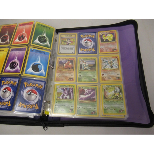 355 - Folder containing a large quantity of Japanese and American Pokemon cards including Base, Jungle, Fo... 