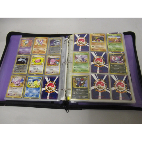 355 - Folder containing a large quantity of Japanese and American Pokemon cards including Base, Jungle, Fo... 