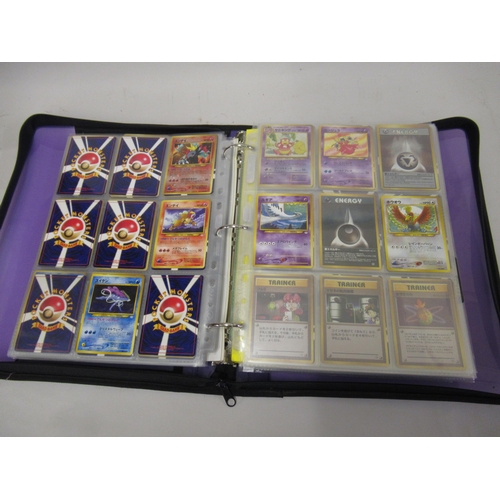 355 - Folder containing a large quantity of Japanese and American Pokemon cards including Base, Jungle, Fo... 