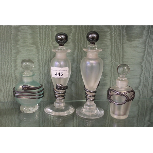 445 - Group of four frosted glass perfume bottles with silver mounts