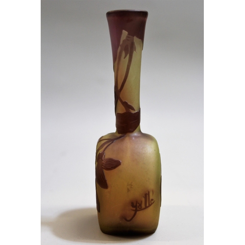 536 - Galle pink overlay cameo glass vase with narrow neck and bulbous body with an all-over floral design... 