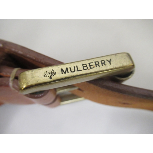 55 - Two Mulberry tan leather belts together with a quantity of various other belts