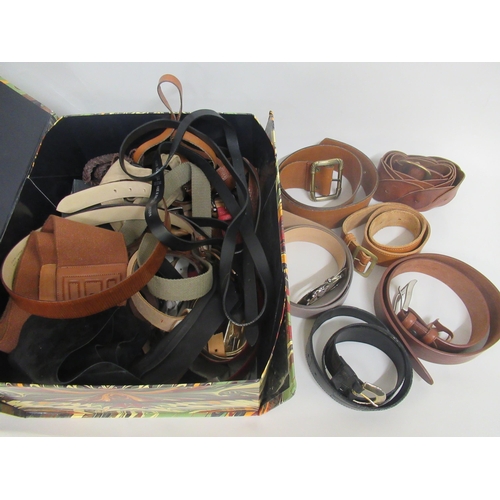 55 - Two Mulberry tan leather belts together with a quantity of various other belts