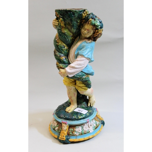 561 - 19th Century Continental majolica stand in the form of a child holding a cornucopia (lacking top) 37... 