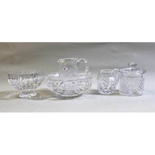 562 - Two cut glass decanters with various labels including a pair of silver Port and Sherry labels, an Ar... 