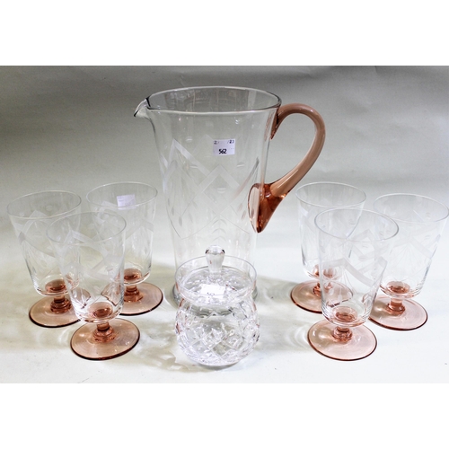 562 - Two cut glass decanters with various labels including a pair of silver Port and Sherry labels, an Ar... 