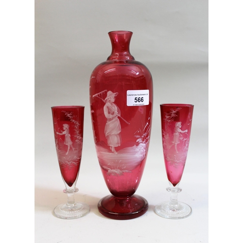 566 - 19th Century cranberry glass baluster form vase with Mary Gregory style decoration, 27.5cms high tog... 