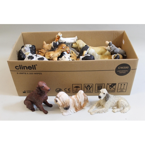 568 - Quantity of various ceramic and composite figures of dogs