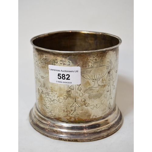 582 - London silver bottle coaster of floral engraved cylindrical form, 11cms high (base weighted)