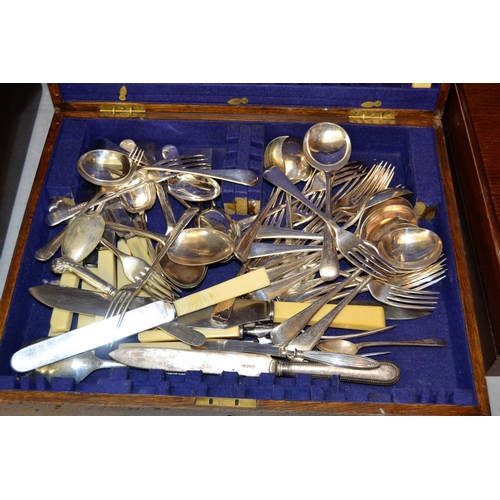 671 - Two oak cased part sets of plated flatware