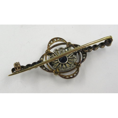 695 - Edwardian diamond, sapphire and seed pearl set bar brooch of pierced design, 41mm wide