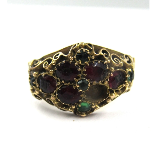 700 - Early 19th Century 15ct gold garnet and emerald set dress ring (minus one stone), size N.5