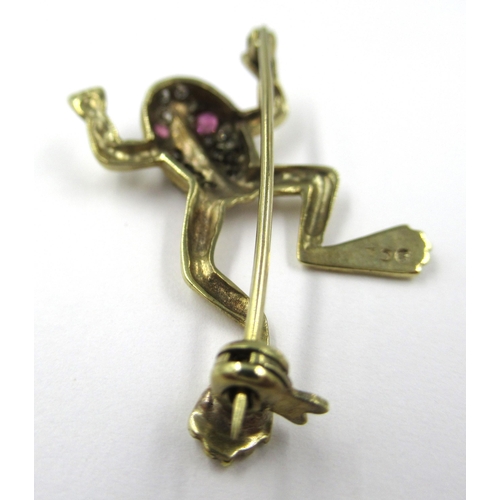 709 - 9ct Gold diamond and ruby set frog brooch, 2.8g