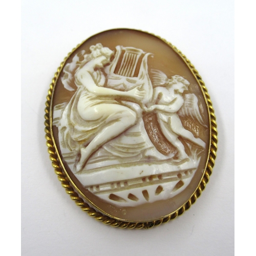 727 - 9ct Yellow gold mounted oval carved shell cameo brooch