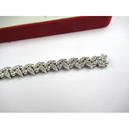 735 - 18ct White gold diamond set bracelet