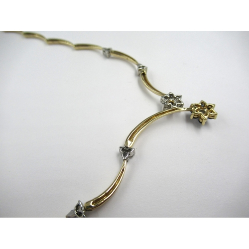 738 - 14ct Gold necklet set with diamonds and sapphires