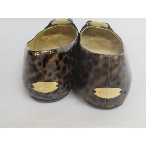 76A - Jimmy Choo, London, pair of leopard print flats, size 37, with original dust cover and a pair of bla... 