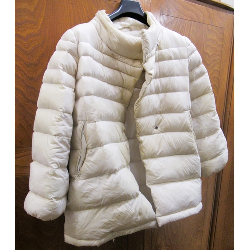 77 - Moncler, ladies navy blue goose down jacket, size 0, with authenticity tag still attached, together ... 